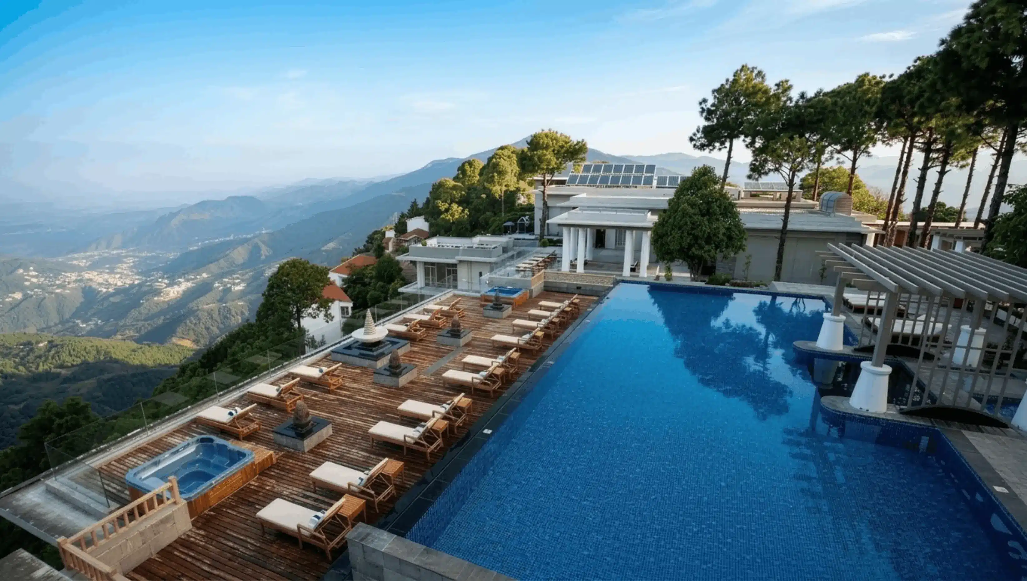 The infinity pool at Moksha dissolving into the Himalayan horizon